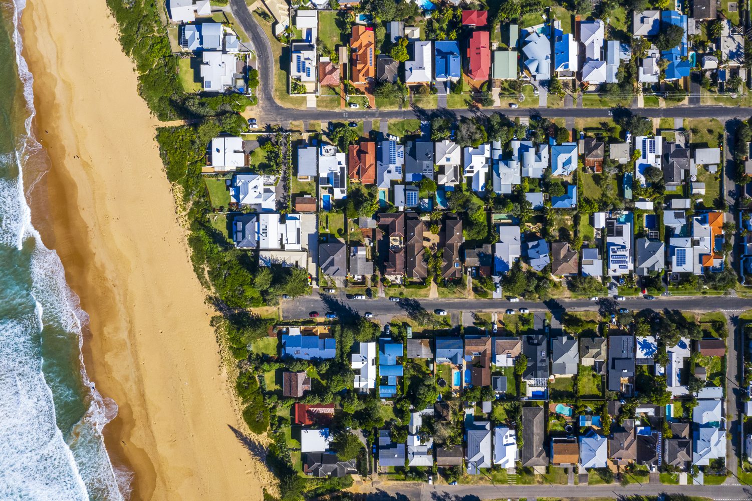 Coastal Suburb overhead perspective roof tops Suburban roof tops with beach