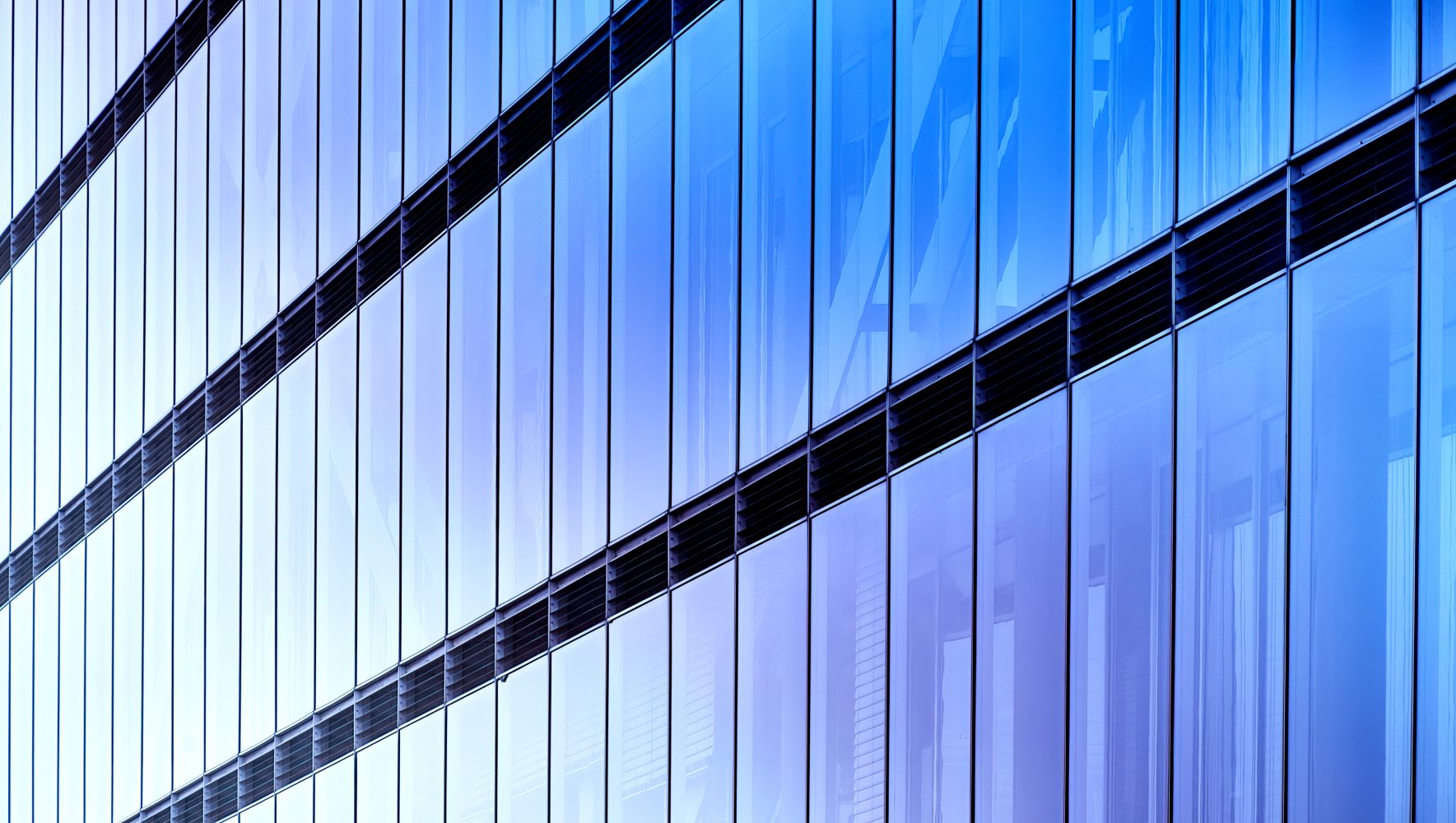Abstract,Glass,Facade,With,Strict,Geometric,Lines,And,Rectangles,In Abstract,Glass,Facade,With,Strict,Geometric,Lines,And,Rectangles,In